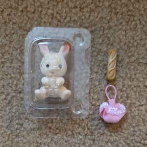 Sylvanian Families Cute Bunny Figurine with Pink Dress and Bread Accessory, New.